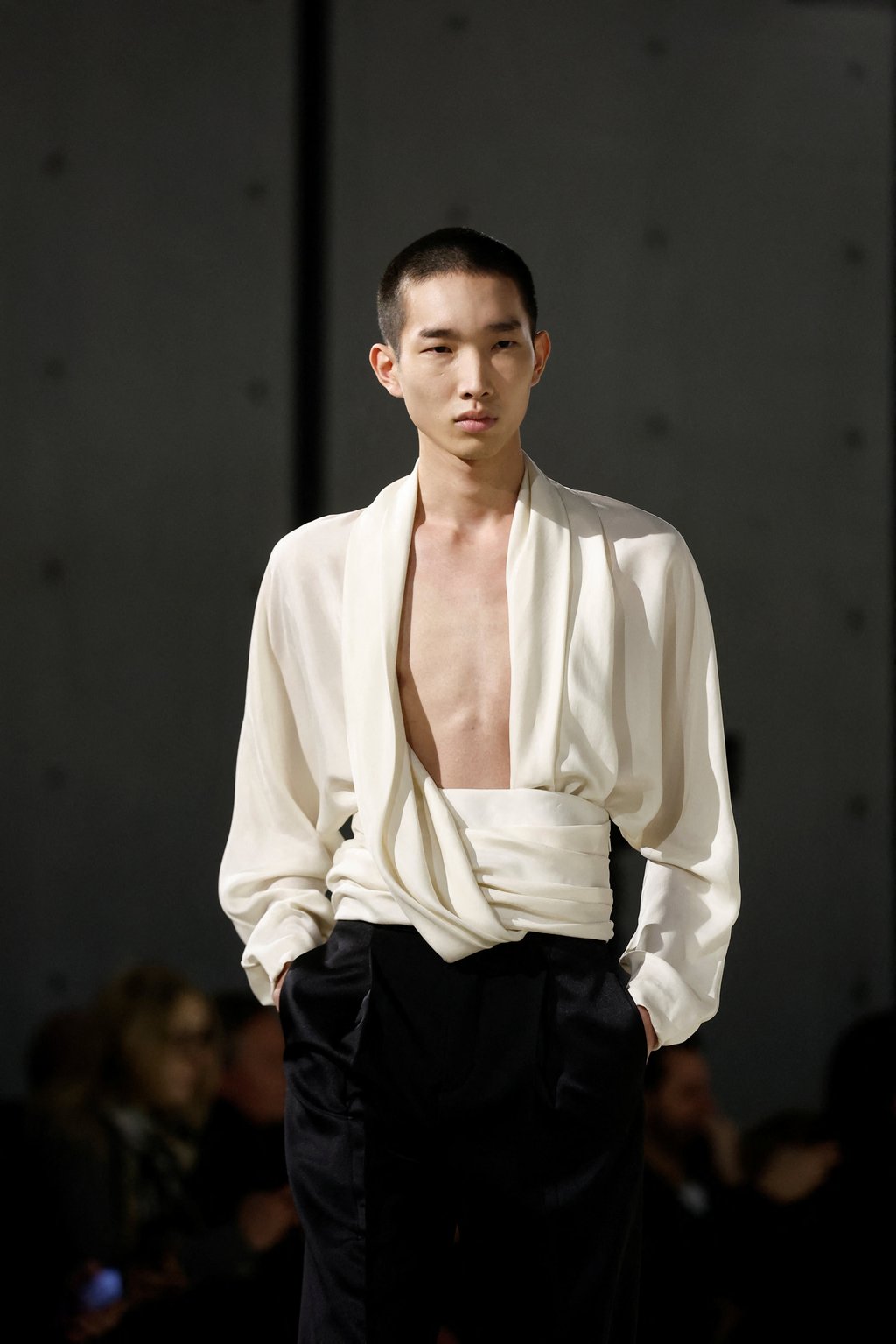 Paris Fashion Week 2023 Saint Laurent opened with designer Anthony Vaccarello s chic evening menswear at the Bourse de Commerce with Jenna Ortega attending and Charlotte Gainsbourg performing South Ch...