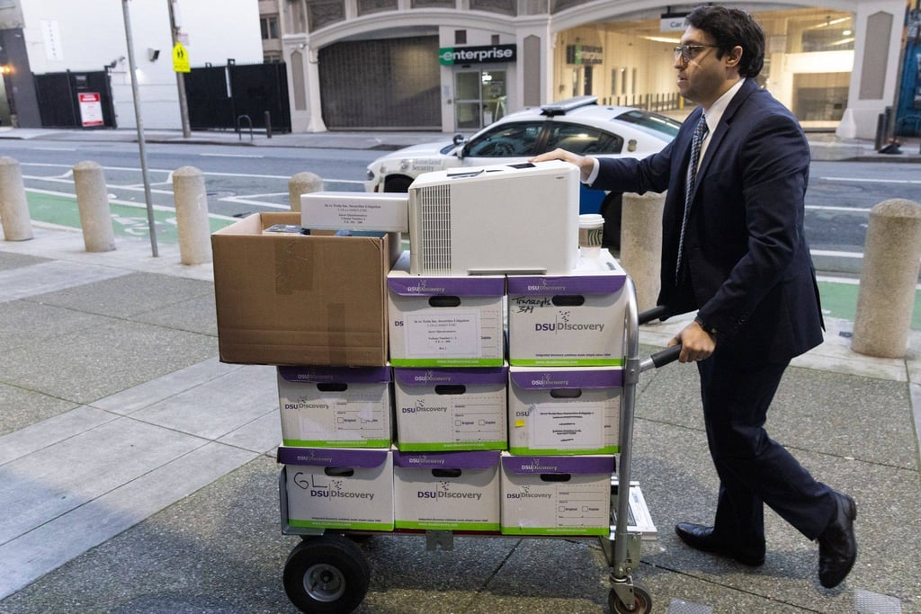 Documents for the shareholder trial against Tesla and Elon Musk arrive at the courthouse in San Francisco, California. Photo: Bloomberg Documents for the shareholder trial against Tesla and Elon Musk arrive at the courthouse in San Francisco, California. Photo: Bloomberg