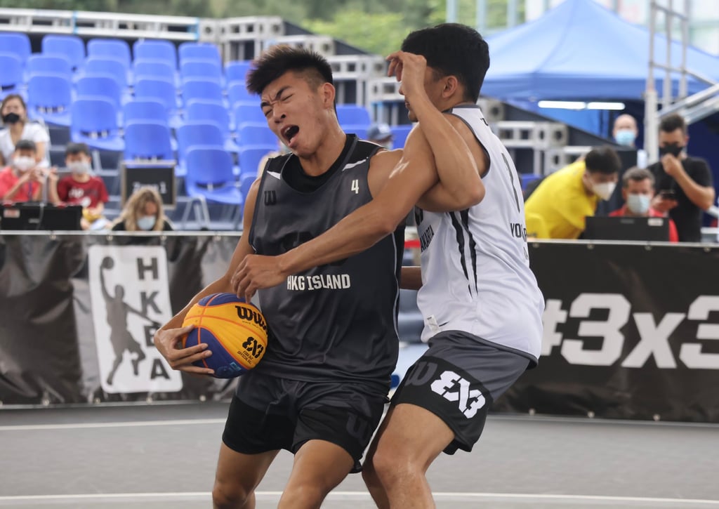 Yiu Pong-yip (left) and Ikram Fadhil in action at the Fiba 3x3 World Tour Basketball match between Yogyakarta and HKG Island at Victoria Park in Causeway Bay. Photo: Jonathan Wong Yiu Pong-yip (left) and Ikram Fadhil in action at the Fiba 3x3 World Tour Basketball match between Yogyakarta and HKG Island at Victoria Park in Causeway Bay. Photo: Jonathan Wong