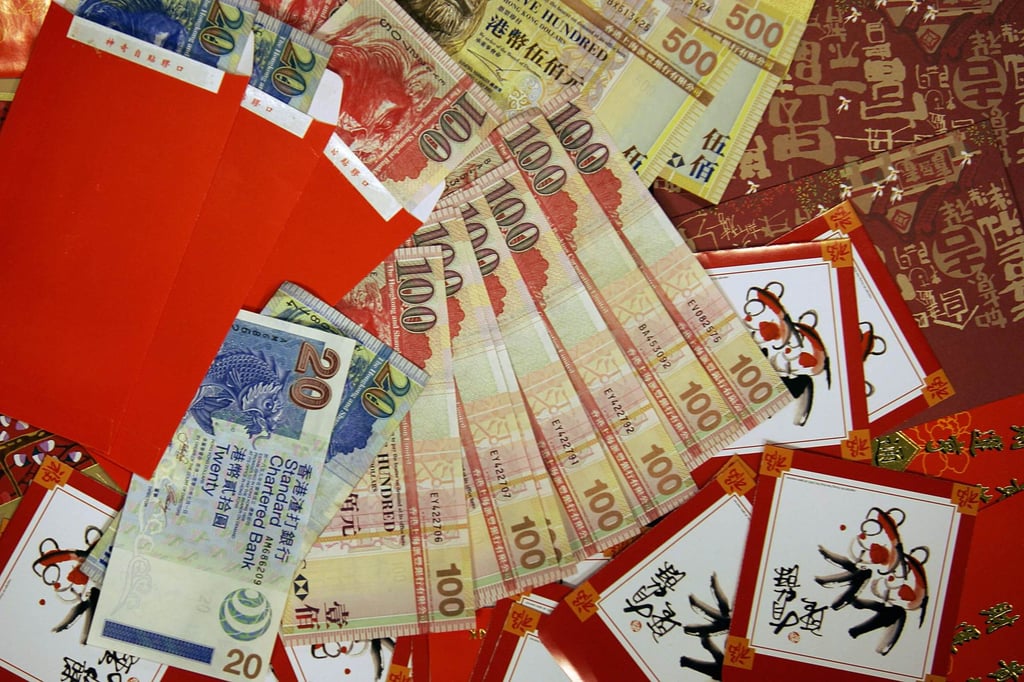 Hong Kong dollars minted to be given as Lunar New Year cash gifts in 2006. Photo: AFP Hong Kong dollars minted to be given as Lunar New Year cash gifts in 2006. Photo: AFP