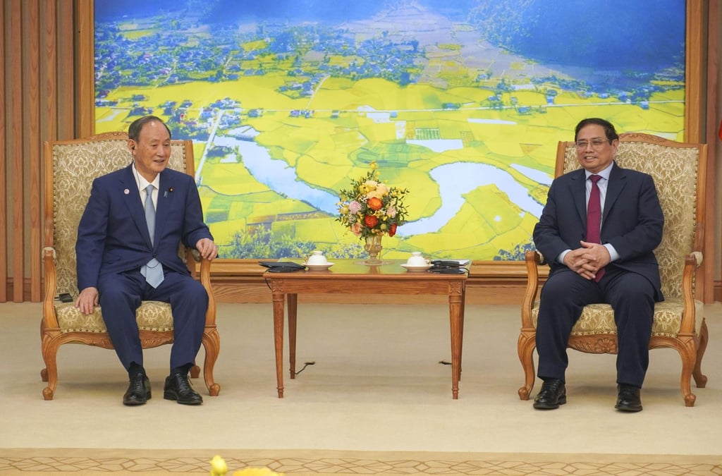 Former Japanese Prime Minister Yoshihide Suga holds talks with Vietnamese Prime Minister Pham Minh Chinh in Hanoi on January 9. Photo: Kyodo Former Japanese Prime Minister Yoshihide Suga holds talks with Vietnamese Prime Minister Pham Minh Chinh in Hanoi on January 9. Photo: Kyodo