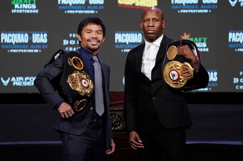 Manny Pacquiao (left) and Yordenis Ugas during a news conference on August 18, 2021, in Las Vegas. Photo: AP Manny Pacquiao (left) and Yordenis Ugas during a news conference on August 18, 2021, in Las Vegas. Photo: AP