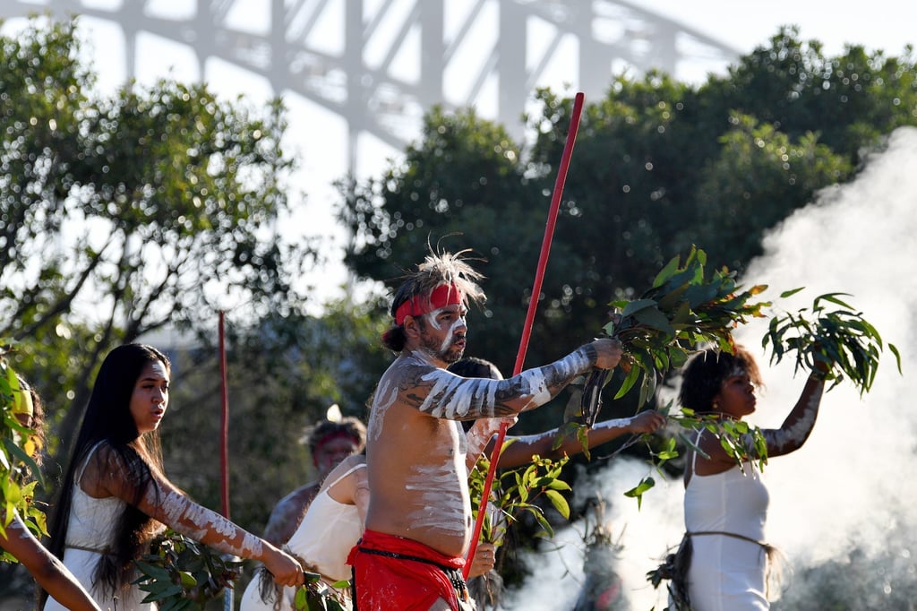Koomurri dancers perform a smoking ceremony during the Australia Day celebration in Sydney. Photo: EPA-EFE