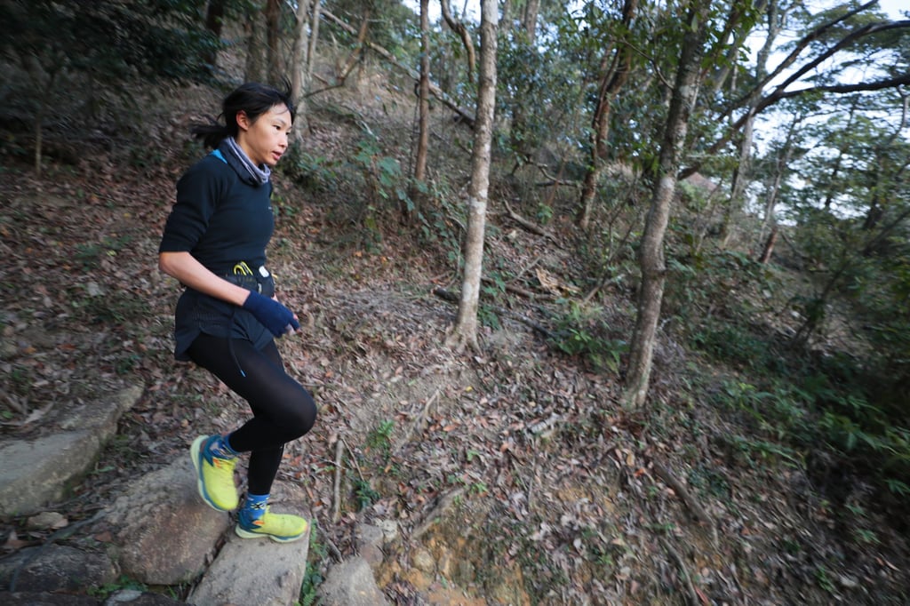 Women’s winner Karen Cheung tackles a difficult downhill section during the HK50 West race. Photo: Action Asia