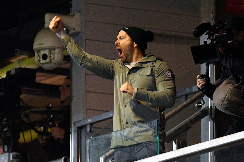 US actor and Wrexham owner Ryan Reynolds reacts during the English FA Cup fourth round football match between Wrexham and Sheffield United at the Racecourse Ground Stadium in Wrexham, Wales, on Sunday. Photo: AFP