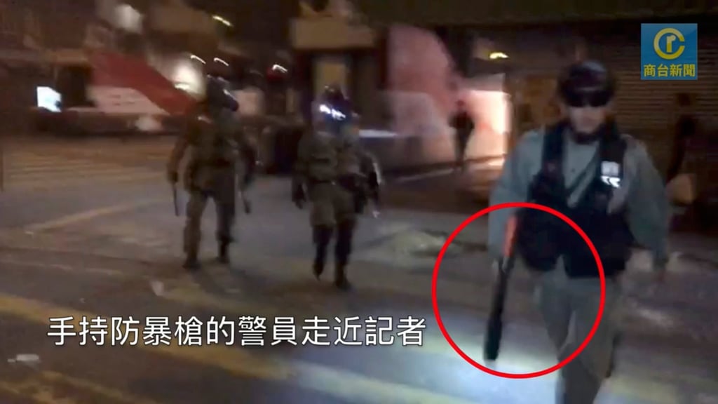 A police officer armed with a specialist weapon designed to fire tear gas and sponge grenades at a demonstration in Mong Kok in 2019. Photo: Handout