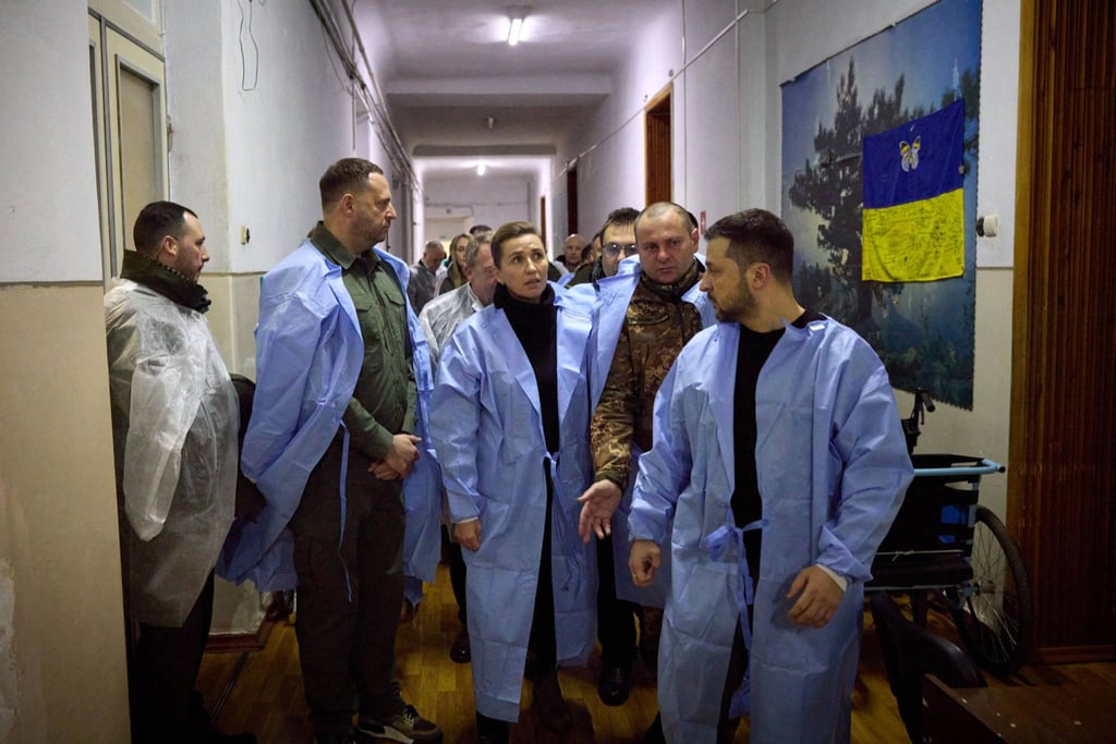 Ukraine’s President Volodymyr Zelensky (right) and Danish Prime Minister Mette Frederiksen (centre) visiting a hospital for wounded Ukrainian servicemen. Photo: via AFP Ukraine’s President Volodymyr Zelensky (right) and Danish Prime Minister Mette Frederiksen (centre) visiting a hospital for wounded Ukrainian servicemen. Photo: via AFP
