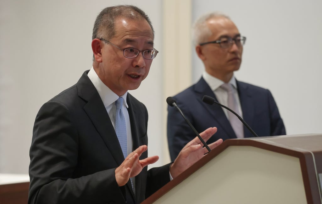 (L to R) Eddie Yue Wai-man, CEO of the Hong Kong Monetary Authority, and Howard Lee, CEO of the Exchange Fund Investment Office, at a press conference on Monday at the HKMA offices. Photo: Jonathan Wong (L to R) Eddie Yue Wai-man, CEO of the Hong Kong Monetary Authority, and Howard Lee, CEO of the Exchange Fund Investment Office, at a press conference on Monday at the HKMA offices. Photo: Jonathan Wong