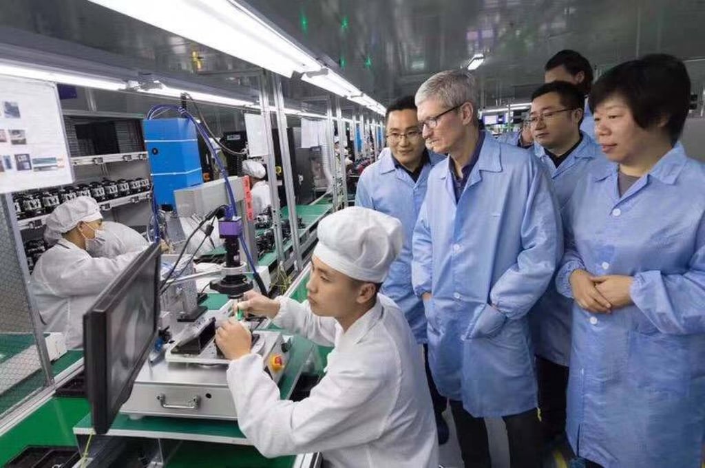 Luxshare Precision Industry Co chairwoman Grace Wang Laichun, far right, accompanies Apple chief executive Tim Cook, fourth from left, during his visit to the Chinese firm’s AirPods assembly line in Kunshan, a city in eastern Jiangsu province, on December 4, 2017. Photo: Handout Luxshare Precision Industry Co chairwoman Grace Wang Laichun, far right, accompanies Apple chief executive Tim Cook, fourth from left, during his visit to the Chinese firm’s AirPods assembly line in Kunshan, a city in eastern Jiangsu province, on December 4, 2017. Photo: Handout