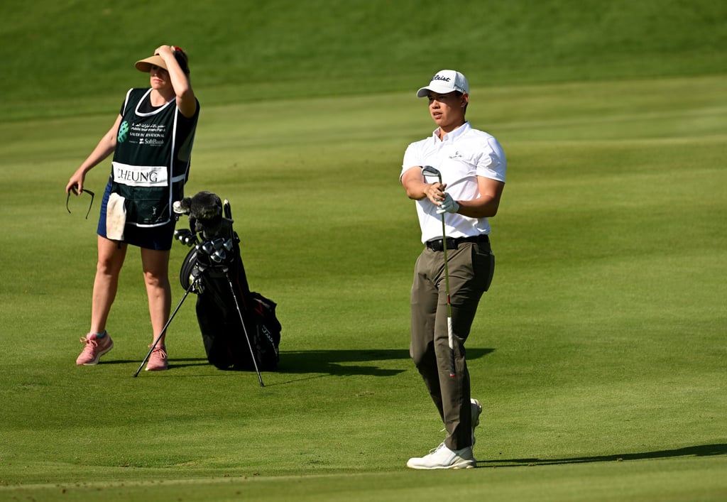 Matthew Cheung watches his approach to the second green during the final round of the PIF Saudi International. Photo: Asian Tour. Matthew Cheung watches his approach to the second green during the final round of the PIF Saudi International. Photo: Asian Tour.