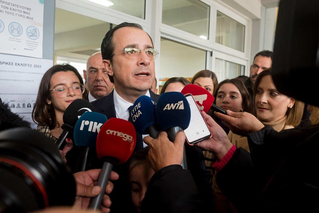 Former Cypriot foreign minister and presidential candidate Nikos Christodoulides addresses reporters at the Geroskypou polling centre in Paphos, Cyprus on Sunday. Photo: AFP Former Cypriot foreign minister and presidential candidate Nikos Christodoulides addresses reporters at the Geroskypou polling centre in Paphos, Cyprus on Sunday. Photo: AFP