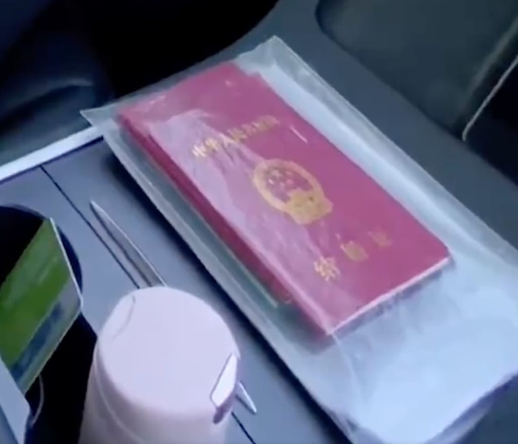 The couple’s new marriage document as shown in the viral video after they remarried at a local registration office. Photo: Weibo