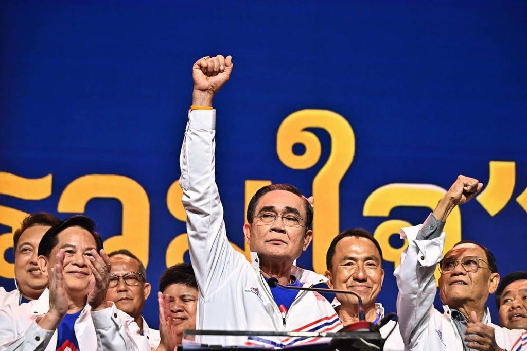 Thai prime minister Prayuth Chan-ocha (C) addresses supporters before coming elections in Bangkok. Photo: AFP/File