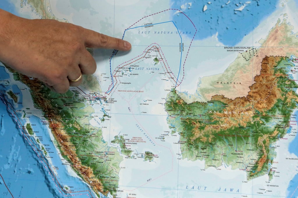 An official points at a map showing the location of Indonesia’s North Natuna Sea, parts of which overlaps with Beijing’s territorial claims in the South China Sea. Photo: Reuters An official points at a map showing the location of Indonesia’s North Natuna Sea, parts of which overlaps with Beijing’s territorial claims in the South China Sea. Photo: Reuters