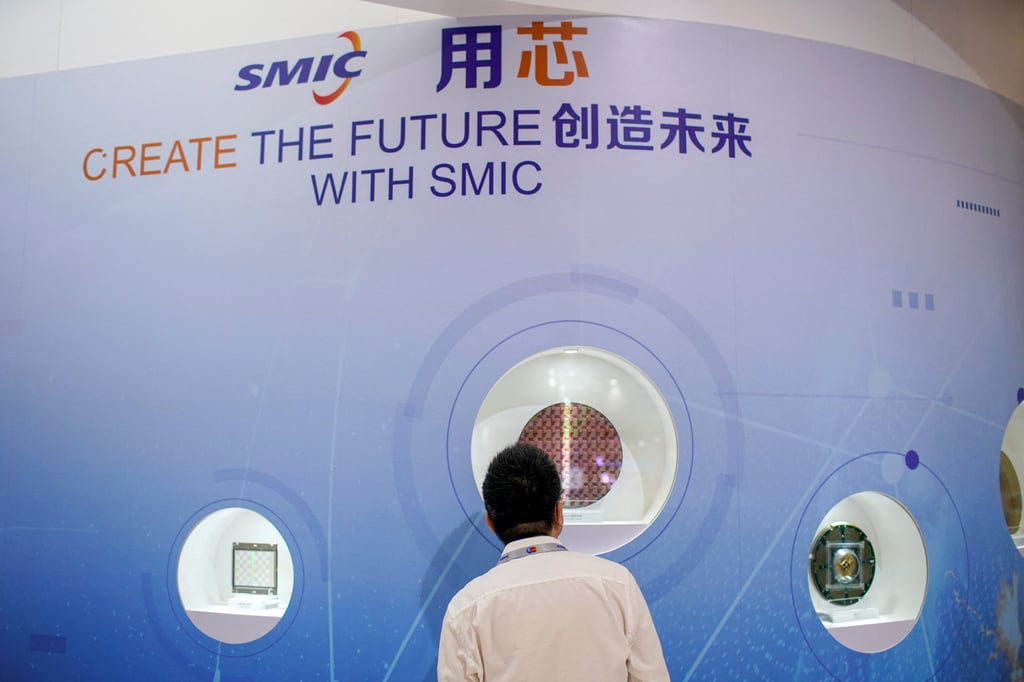 A visitor at an SMIC booth at the China International Semiconductor Expo in 2020. Photo: Reuters A visitor at an SMIC booth at the China International Semiconductor Expo in 2020. Photo: Reuters
