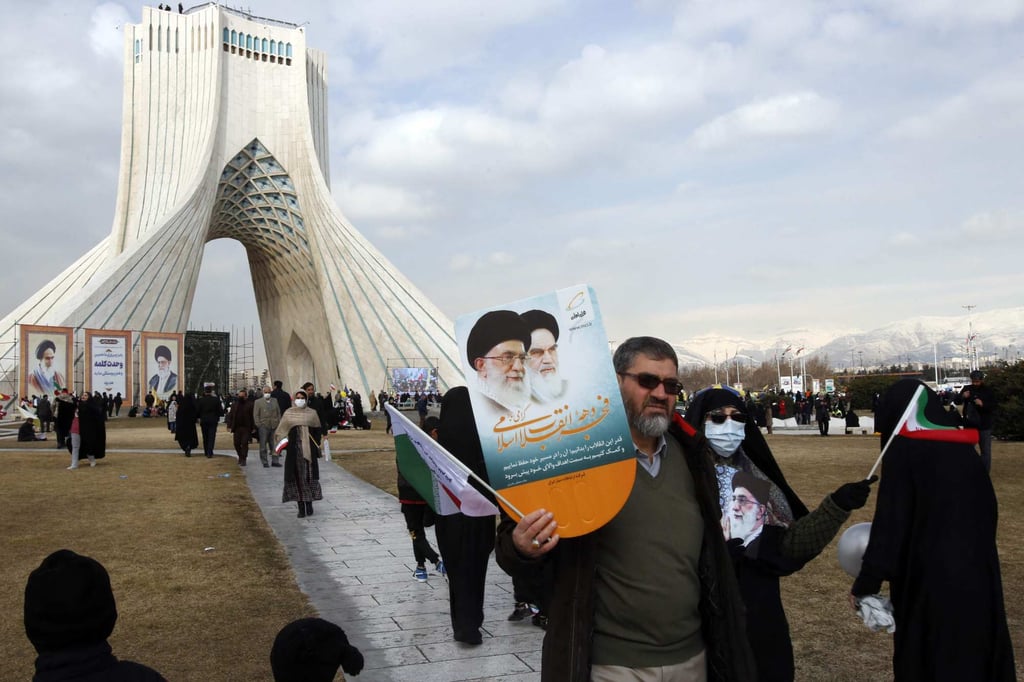 Thousands of Iranians marched through major streets and squares decorated with flags, balloons and placards with revolutionary and religious slogans. Photo: AFP Thousands of Iranians marched through major streets and squares decorated with flags, balloons and placards with revolutionary and religious slogans. Photo: AFP
