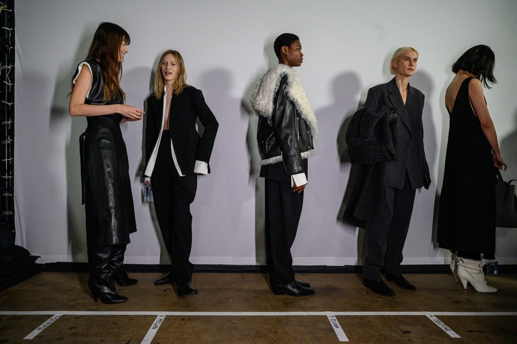 Models wearing creations by Proenza Schouler gather backstage before their runway show during New York Fashion Week on February 11. Photo: AFP Models wearing creations by Proenza Schouler gather backstage before their runway show during New York Fashion Week on February 11. Photo: AFP