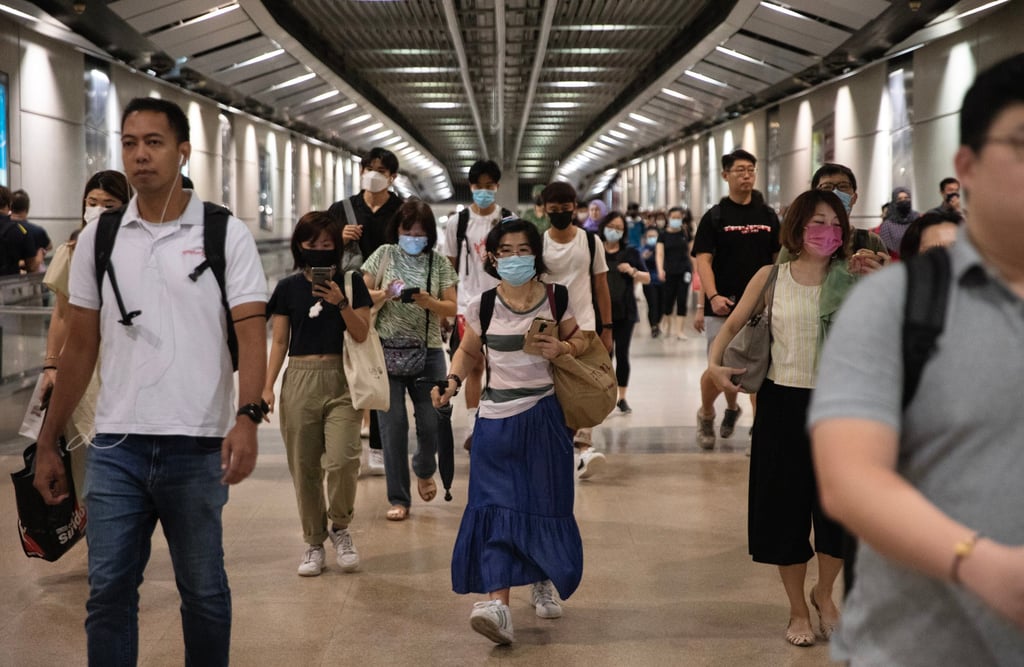 People walk in an underground MRT railway station in Singapore. Photo: EPA-EFE People walk in an underground MRT railway station in Singapore. Photo: EPA-EFE