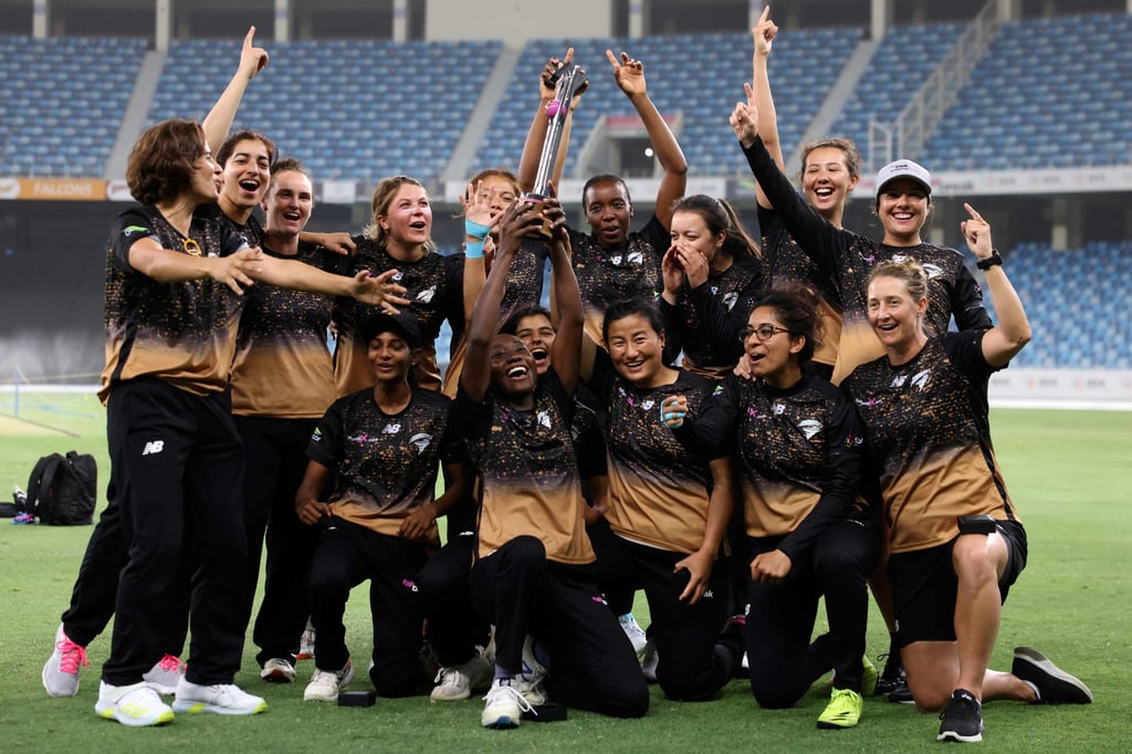 Tornadoes players pose with the trophy after their win in the FairBreak Invitational 2022 women’s final. Photo: AFP