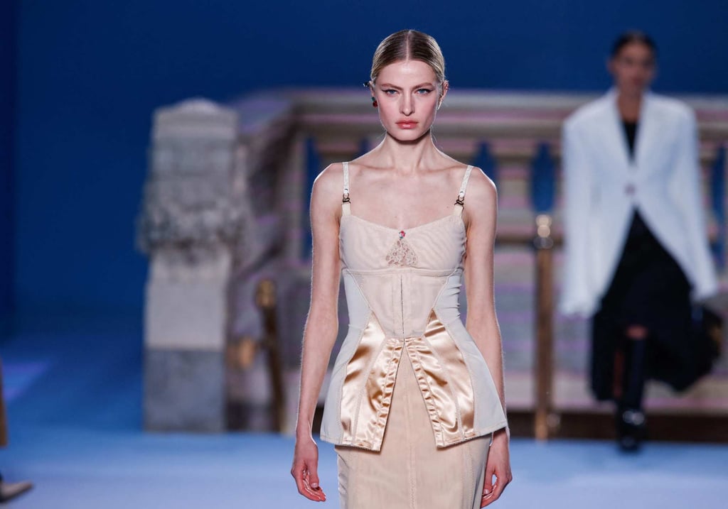 A model walks the runway wearing a neutral-toned top for Tory Burch during New York Fashion Week on February 13. Photo: AFP