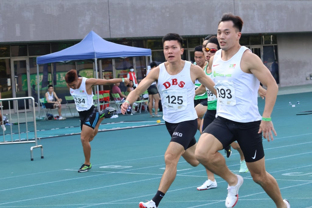 Ng Ka-fung (right) wins the men’s 100m in a time of 10.43 seconds at Tseung Kwan O Sports Ground. Photo: Shirley Chui