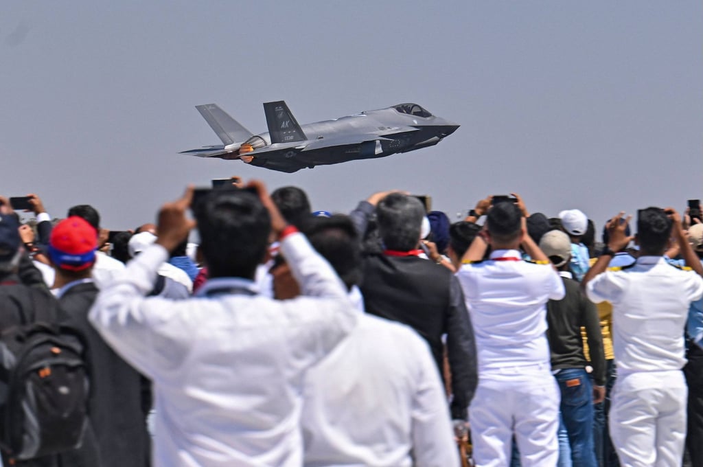 Spectators watch as a US Air Force’s (USAF) fifth-generation supersonic multirole F-35 fighter jet flies past on the second day of Aero India 2023 at the Yelahanka Air Force Station in Bengaluru on February 14. India and the US are deepening their cooperation in defence and technology. Photo: AFP Spectators watch as a US Air Force’s (USAF) fifth-generation supersonic multirole F-35 fighter jet flies past on the second day of Aero India 2023 at the Yelahanka Air Force Station in Bengaluru on February 14. India and the US are deepening their cooperation in defence and technology. Photo: AFP