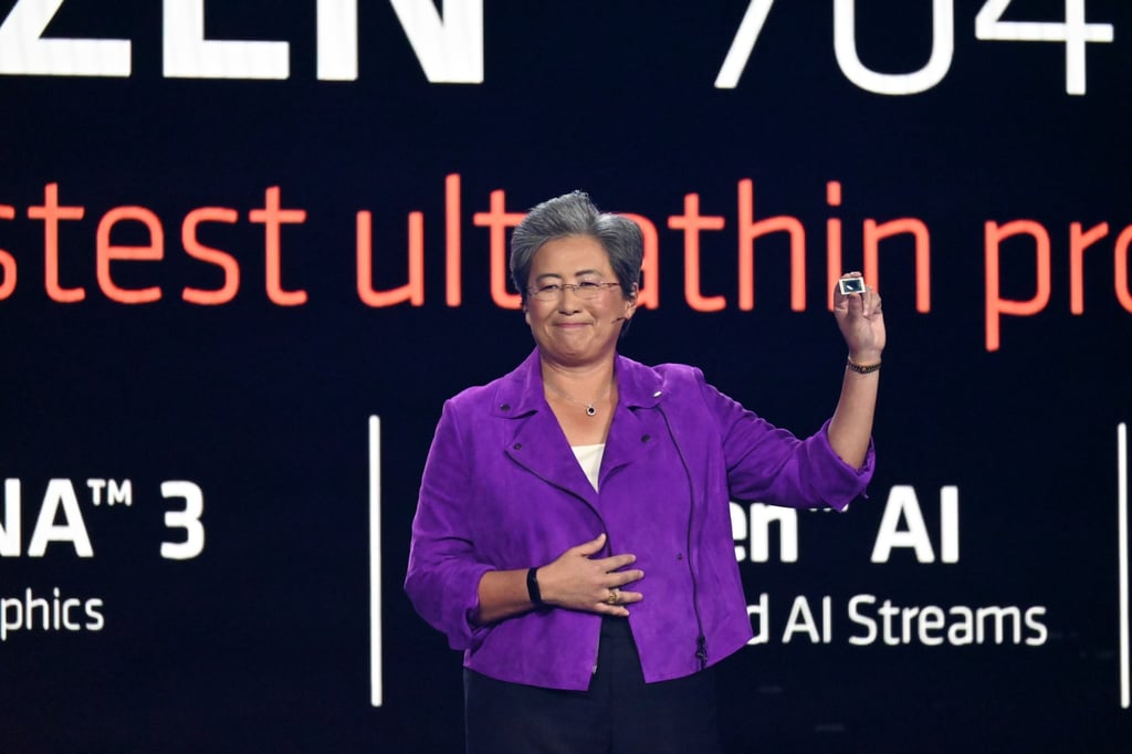 AMD CEO Lisa Su holds up a Ryzen 7040 series chip during her keynote address at CES on January 4, 2023. Photo: Matt Haldane / SCMP AMD CEO Lisa Su holds up a Ryzen 7040 series chip during her keynote address at CES on January 4, 2023. Photo: Matt Haldane / SCMP