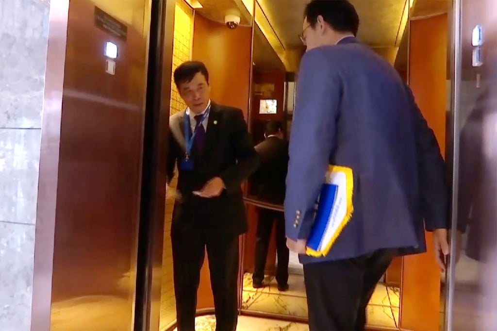 In this image made from video, Chen Xuyuan, head of the Chinese Football Association, gets on an lift in Shanghai on October 24, 2019. The head of China’s national football federation has been arrested on corruption charges in the latest blow to the country’s effort to grow its standing at home and internationally. Photo: AP
