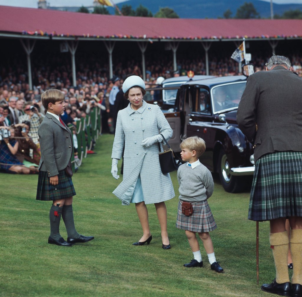 Queen Elizabeth at the Braemar Highland Gathering, Scotland, with her sons Prince Andrew (left) and Prince Edward, in 1969. Photo: Getty Images Queen Elizabeth at the Braemar Highland Gathering, Scotland, with her sons Prince Andrew (left) and Prince Edward, in 1969. Photo: Getty Images