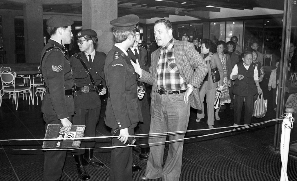 Police on the scene of the bombing at Ocean Terminal, which left 23 shoppers injured and was the most serious bomb blast to hit Hong Kong since 1967. Photo: Sam Chan