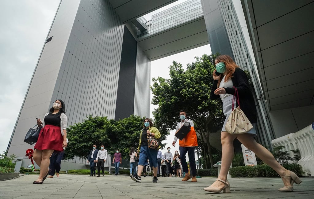 Civil servants head to work at the government offices in Admiralty, on May 31, 2021. Photo: Felix Wong