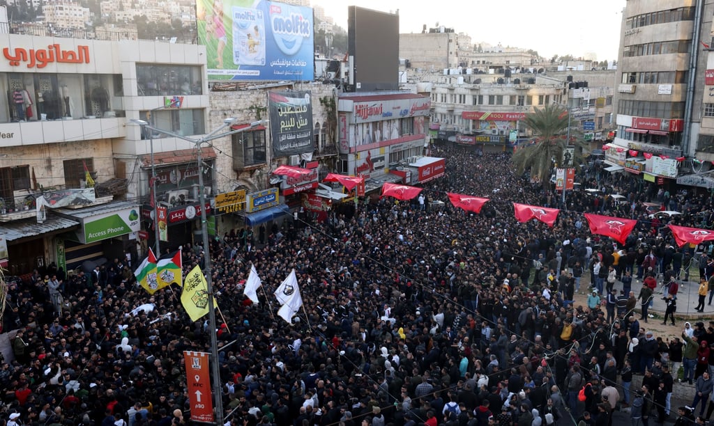 Mourners carry the remains of a people killed during an Israeli raid in Nablus on Wednesday. Photo: EPA-EFE