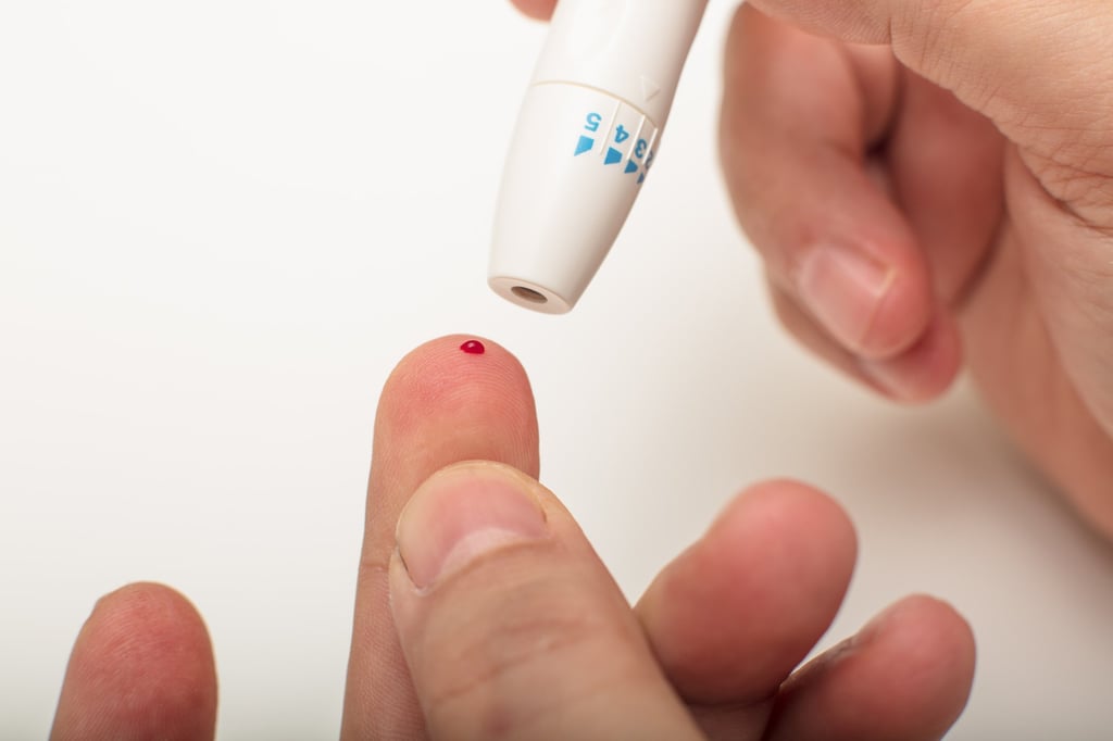 Blood sugar is normally monitored every day though capillary blood, taken by pricking the fingertip. Apple and others are working on non-invasive methods to do the same job. Photo: Shutterstock
