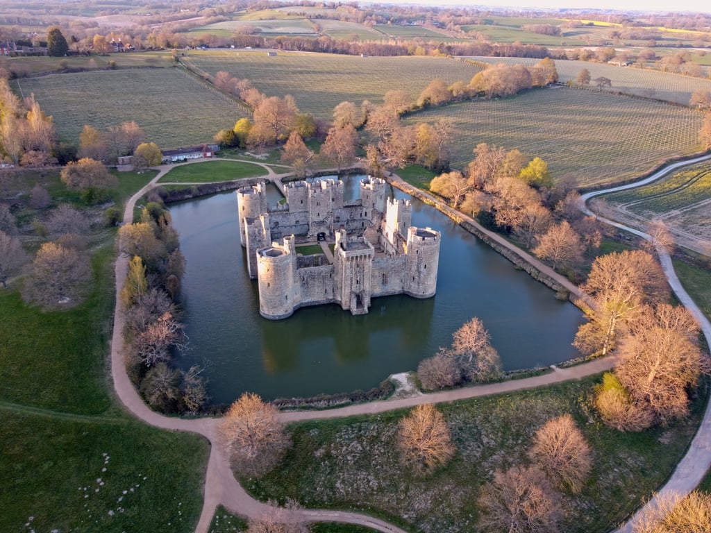 Bodiam Castle, a 14th-century medieval fortress with a moat and towers in East Sussex, England. An Englishman’s home is his castle, it is said. Photo: Shutterstock