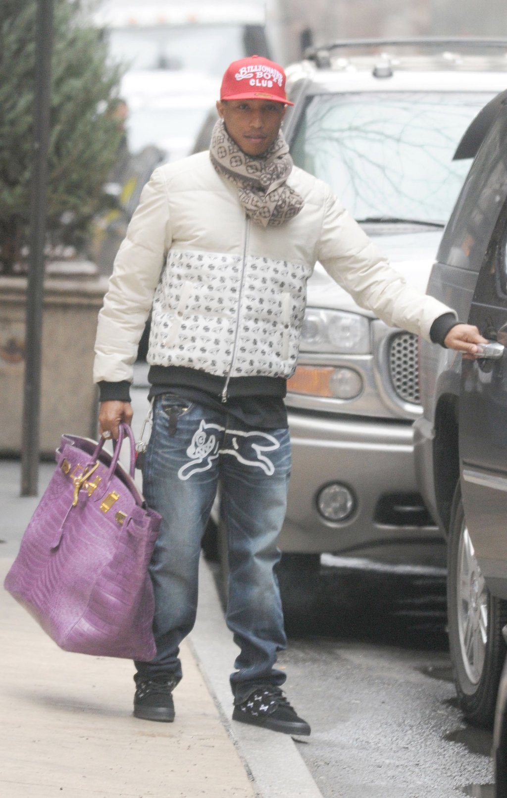 9 of Pharrell Williams boldest fashion moments Louis Vuitton s new menswear creative director wore Nike boots at Cannes a reflective Adidas suit at the Grammys and a purple Hermes Birkin in NYC