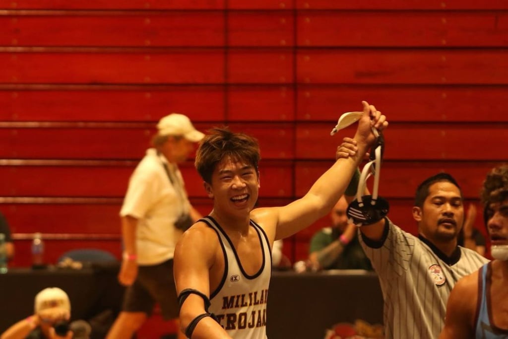 Adrian Lee celebrates winning the Hawaii high school state title. Adrian Lee celebrates winning the Hawaii high school state title.