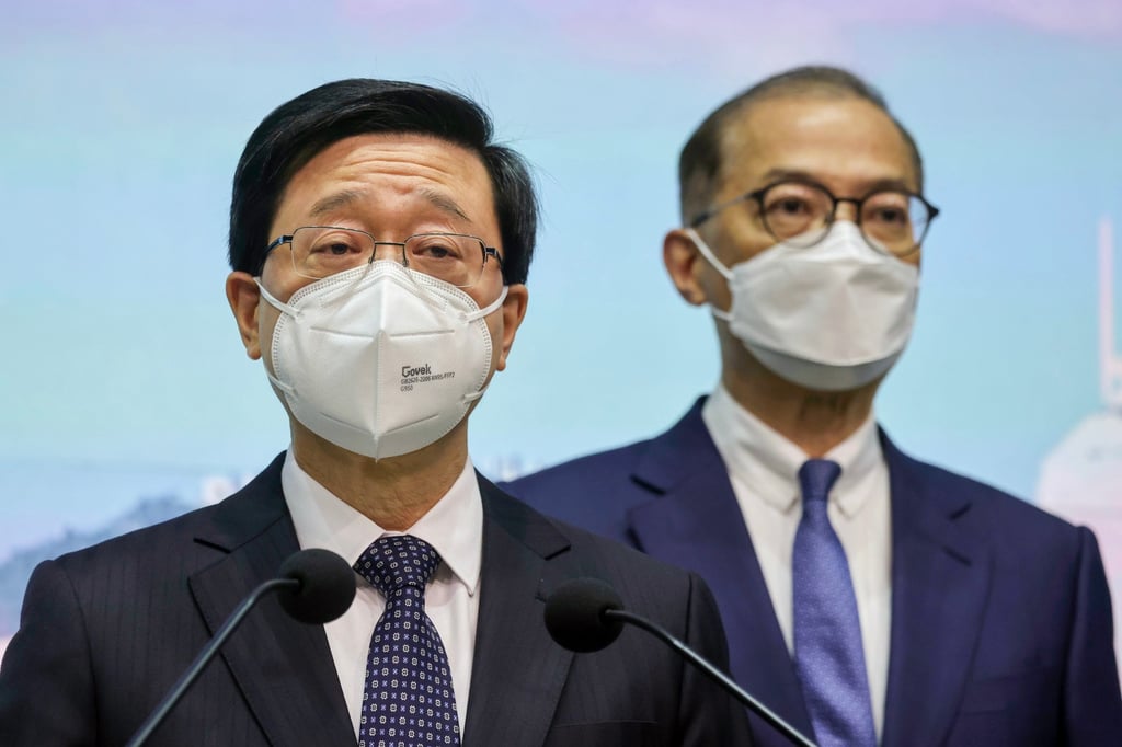 (From left) Chief Executive John Lee and Secretary for Health Lo Chung-mau at Tuesday’s press conference. Photo: Jonathan Wong (From left) Chief Executive John Lee and Secretary for Health Lo Chung-mau at Tuesday’s press conference. Photo: Jonathan Wong