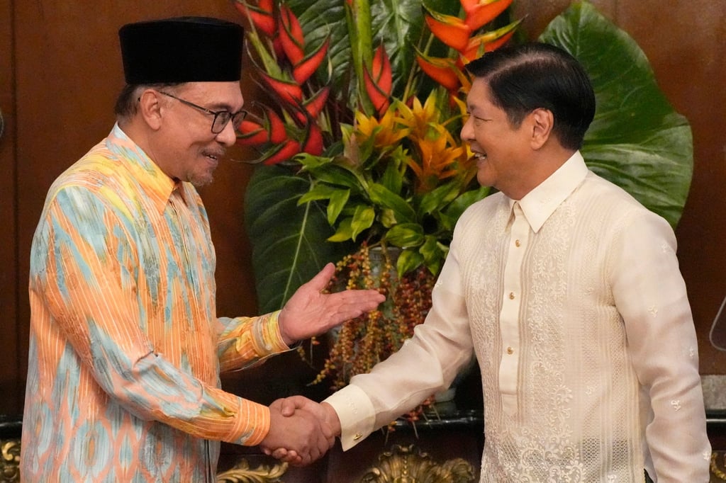 Malaysia’s PM Anwar Ibrahim (left) and Philippine President Ferdinand Marcos Jnr shake hands at Malakanang presidential palace in Manila on March 1, 2023. Photo: EPA-EFE