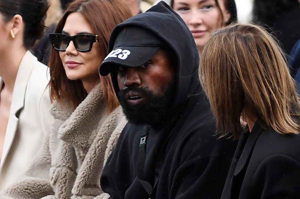 US rapper Kanye West (centre) attends the Givenchy spring/summer 2023 fashion show during the Paris Womenswear Fashion Week in Paris, France, in October 2022. Photo: TNS