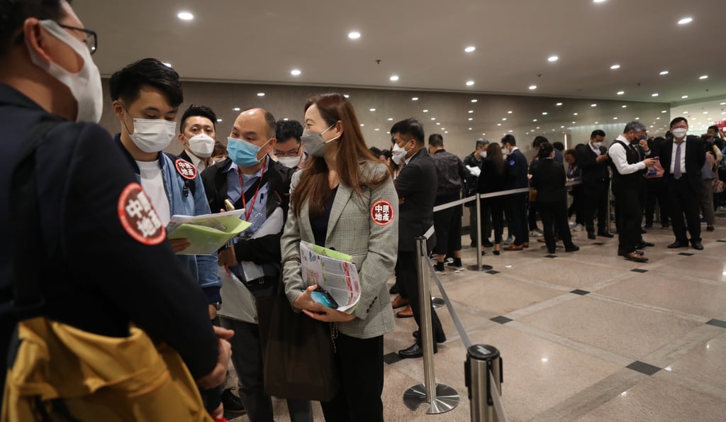 Potential buyers wait to purchase flats in the Koko Rosso development at an office in Tsim Sha Tsui on February 24, 2023. Photo: Xiaomei Chen