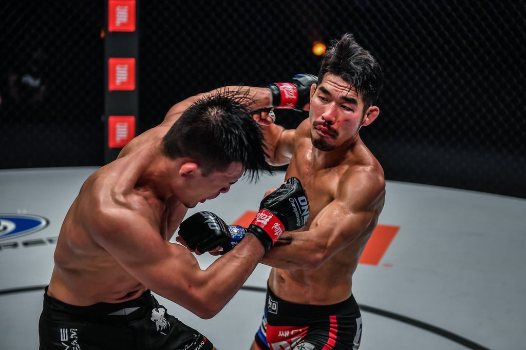 Ok Rae-yoon lands a punch on Christian Lee.
