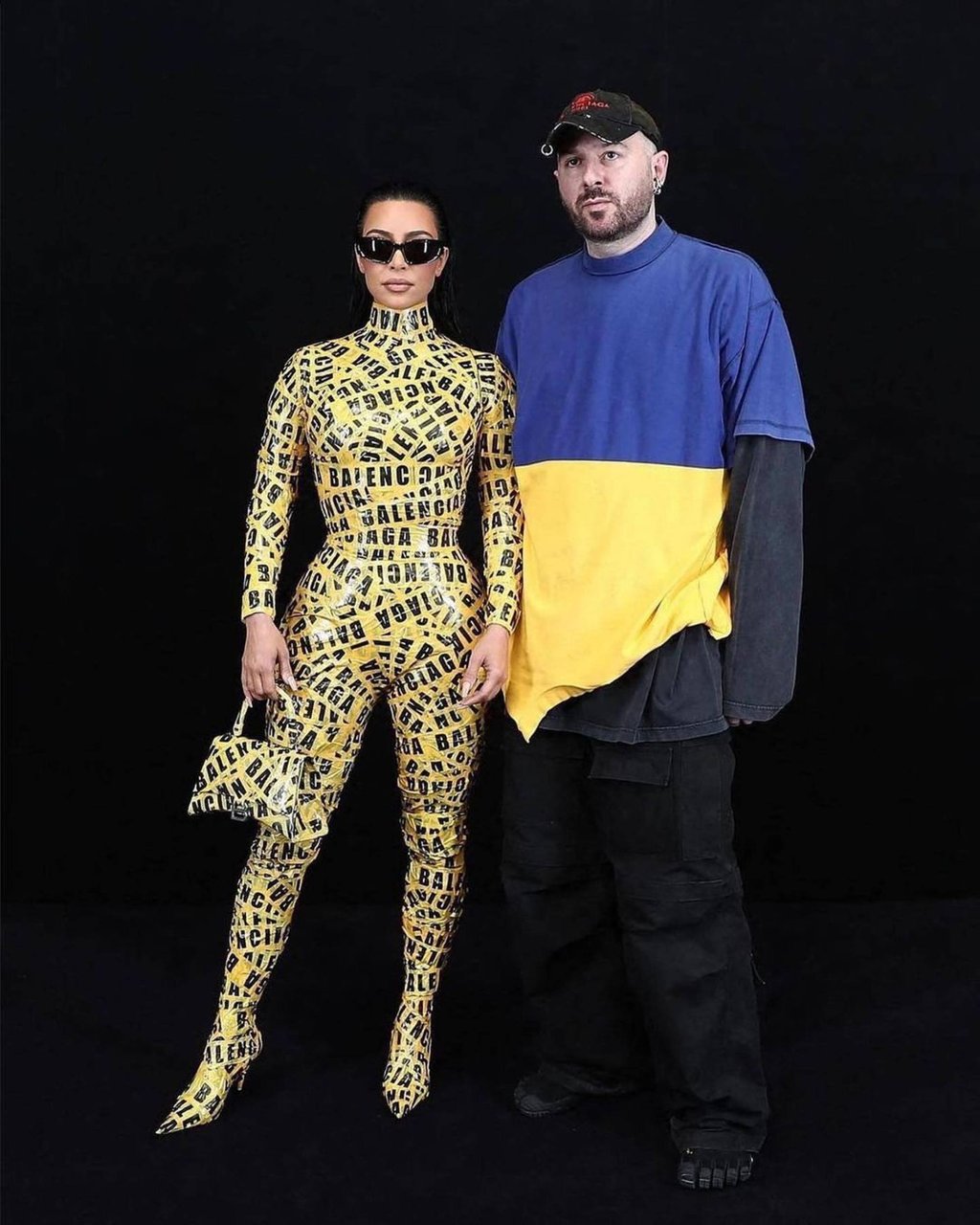 Kim Kardashian and Demna, wearing a T-shirt in the colours of the Ukrainian flag, at the Balenciaga autumn/winter 2022-23 fashion show in Paris. Photo: Instagram