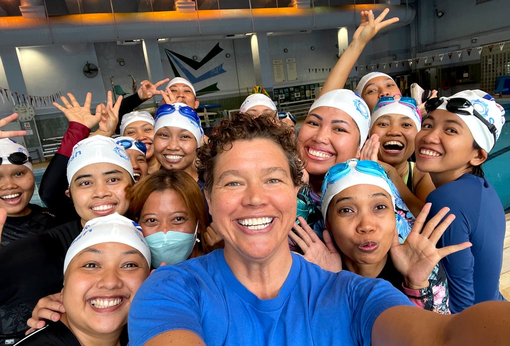 Libby Alexander, co-founder and CEO of Splash Foundation, with some of the group’s swimming students. Photo: Splash Libby Alexander, co-founder and CEO of Splash Foundation, with some of the group’s swimming students. Photo: Splash