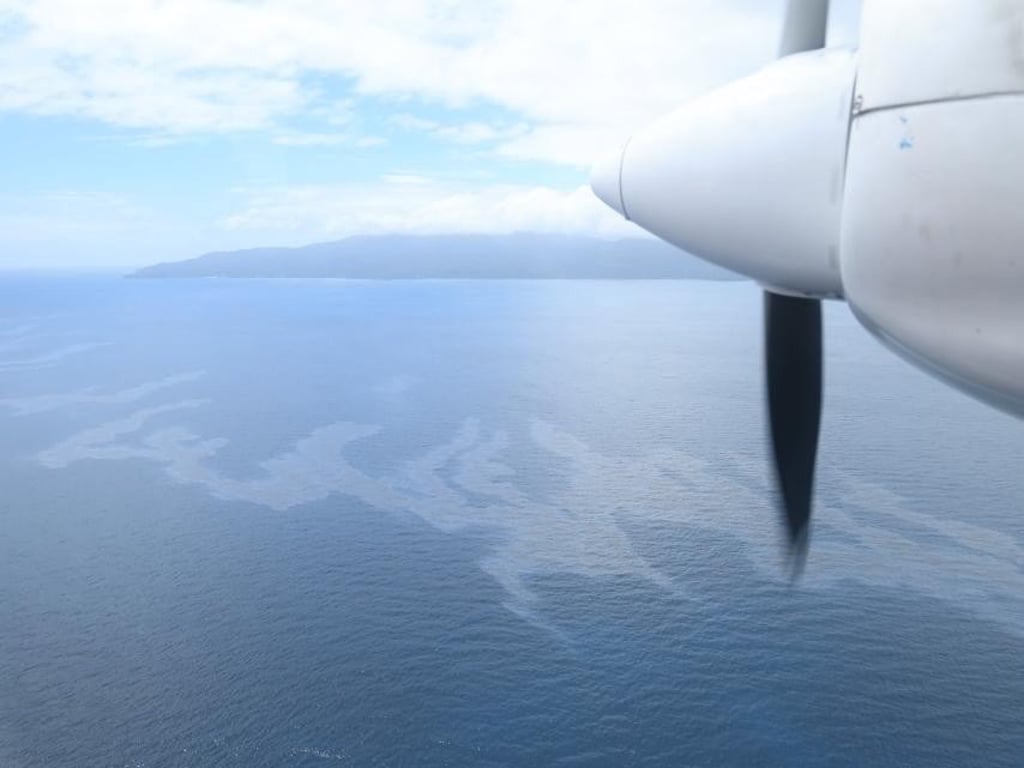An aerial view of an oil spill in the vicinity waters. Photo: EPA-EFE