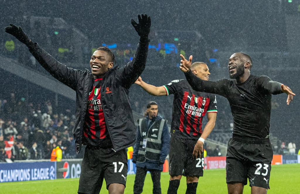 AC Milan players celebrate after reaching the Uefa Champions League quarterfinals. Photo: Xinhua