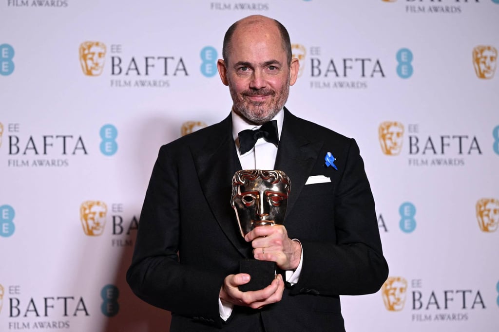 Edward Berger at the Baftas last month, where All Quiet on the Western Front won seven prizes, including those for best director (above) and best film. Photo: AFP