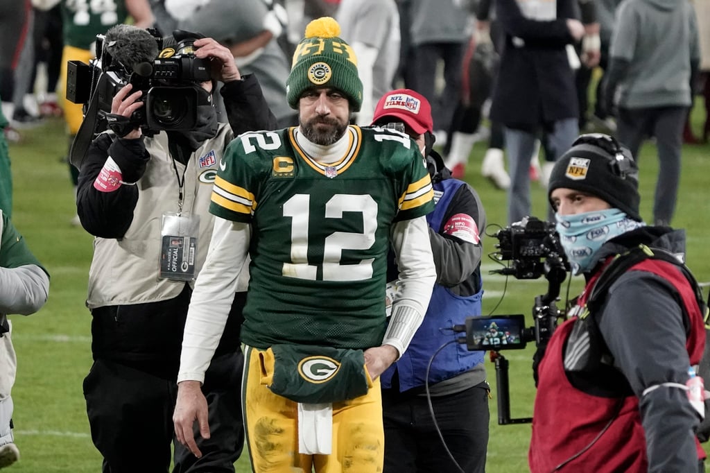 Green Bay Packers quarterback Aaron Rodgers walks off the field after a game in Wisconsin in 2021. After he spoke about his experience at a “dark retreat”, the internet lit up with searches for the term. Photo: AP