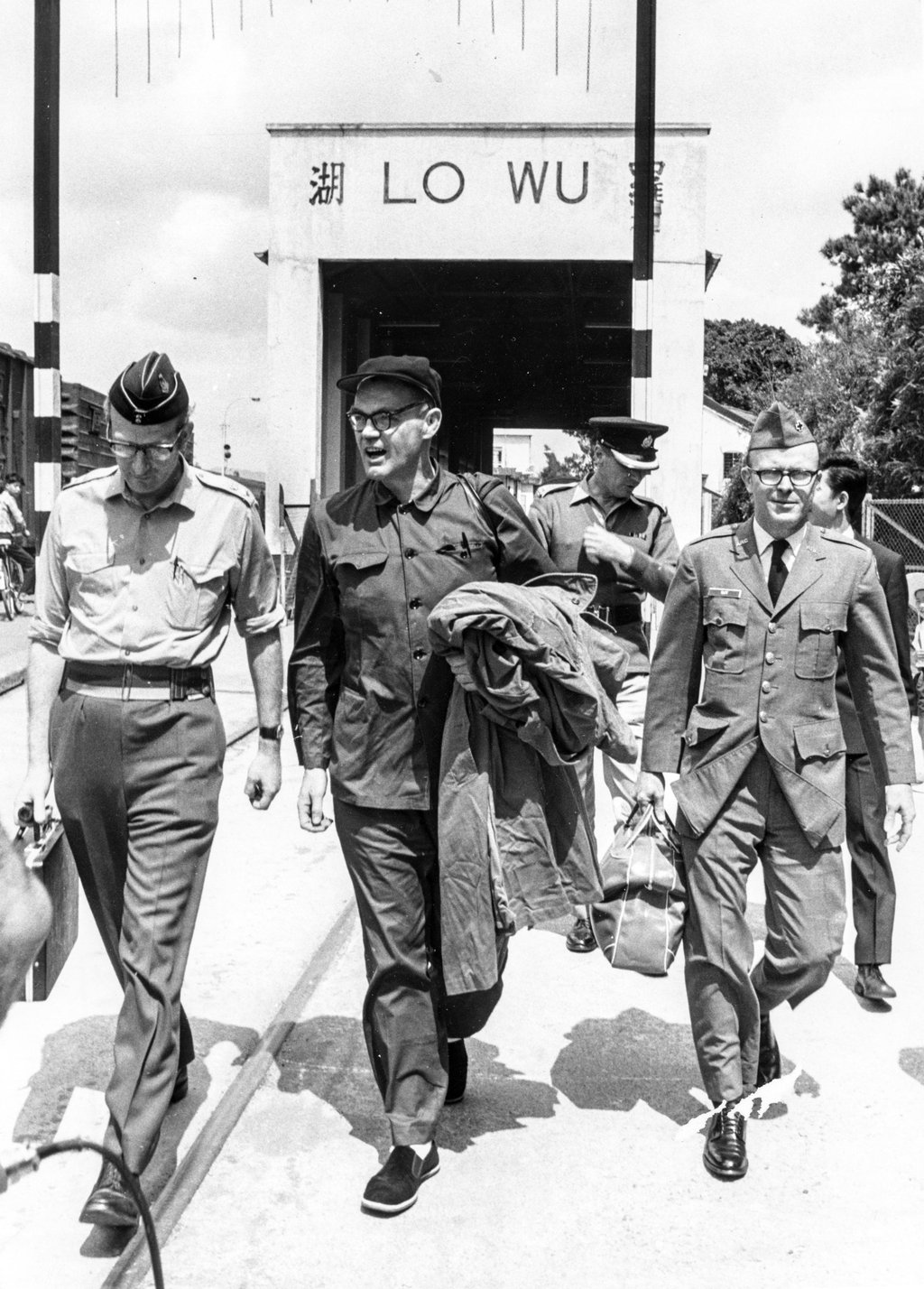 John Downey (centre) crosses the border from China into Hong Kong on March 12, 1973. Downey was imprisoned in 1952 for spying for the United States, which it long denied. Photo: ISD John Downey (centre) crosses the border from China into Hong Kong on March 12, 1973. Downey was imprisoned in 1952 for spying for the United States, which it long denied. Photo: ISD