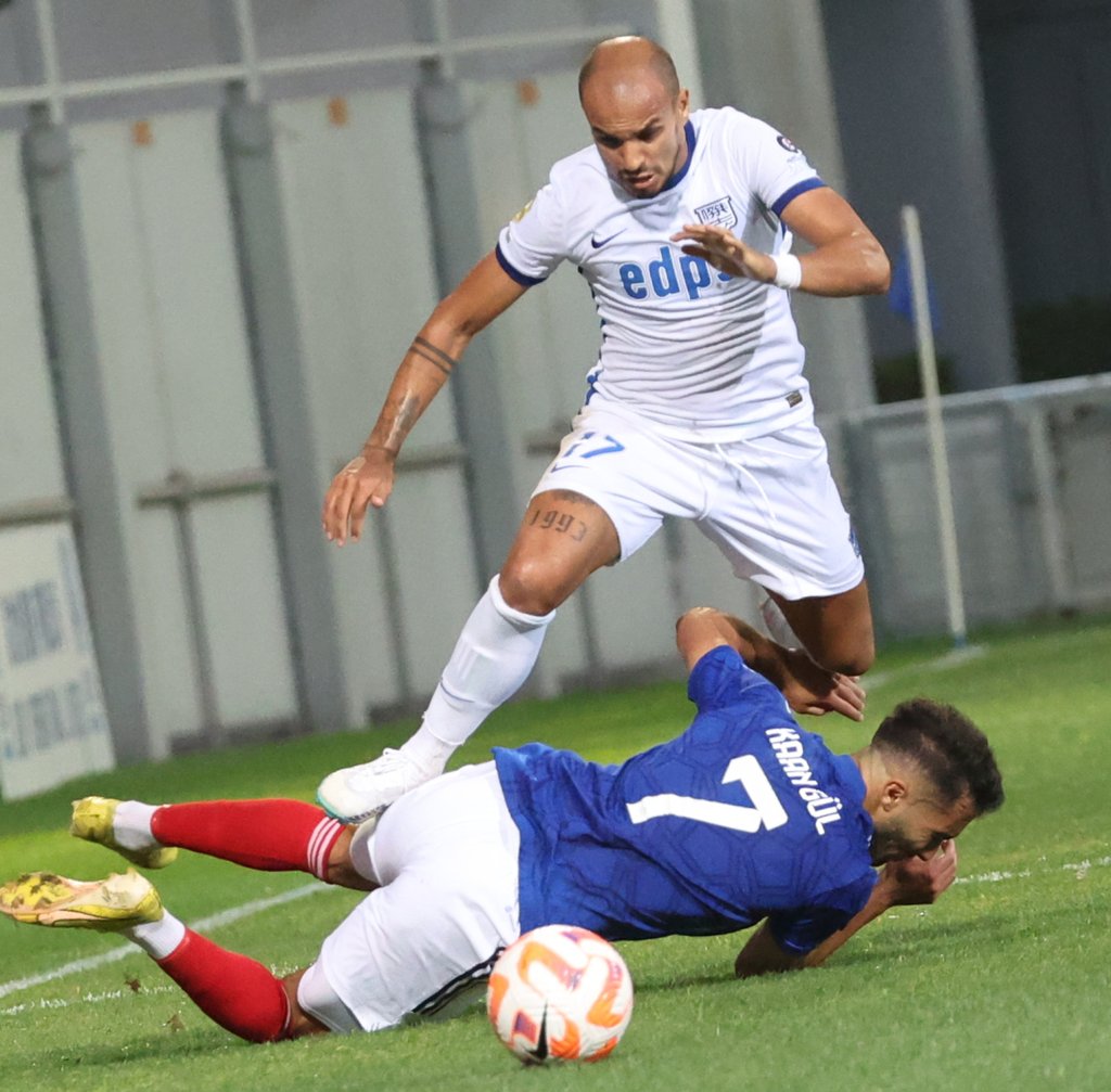 Eastern’s Kaan Gul slides in against Kitchee’s Mikael. Photo: Yik Yeung-man