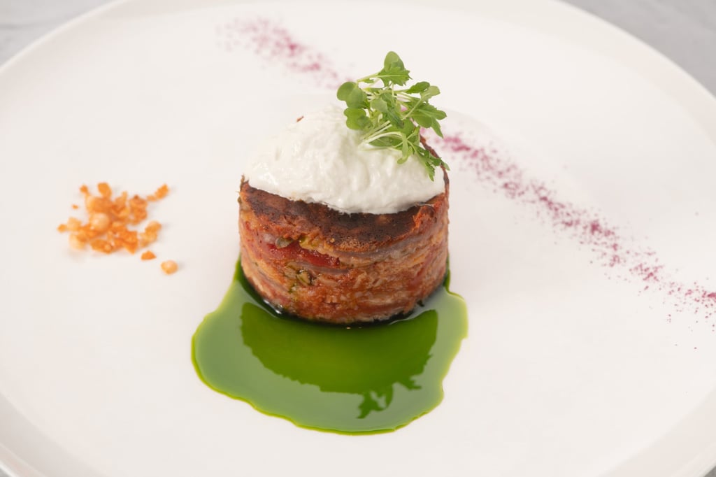 Red onion Parmigiana with burrata and basil oil at Lucale. Photo: Lucale